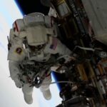 NASA's 2 stuck astronauts take their first spacewalk together