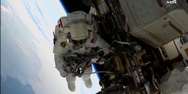 NASA's 2 stuck astronauts take their first spacewalk together