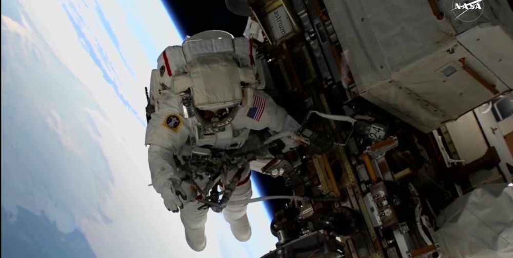 NASA's 2 stuck astronauts take their first spacewalk together